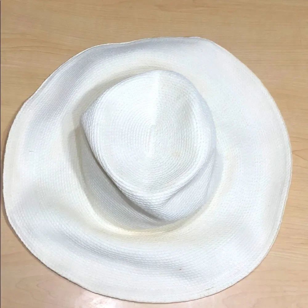 Used floppy hat. White 